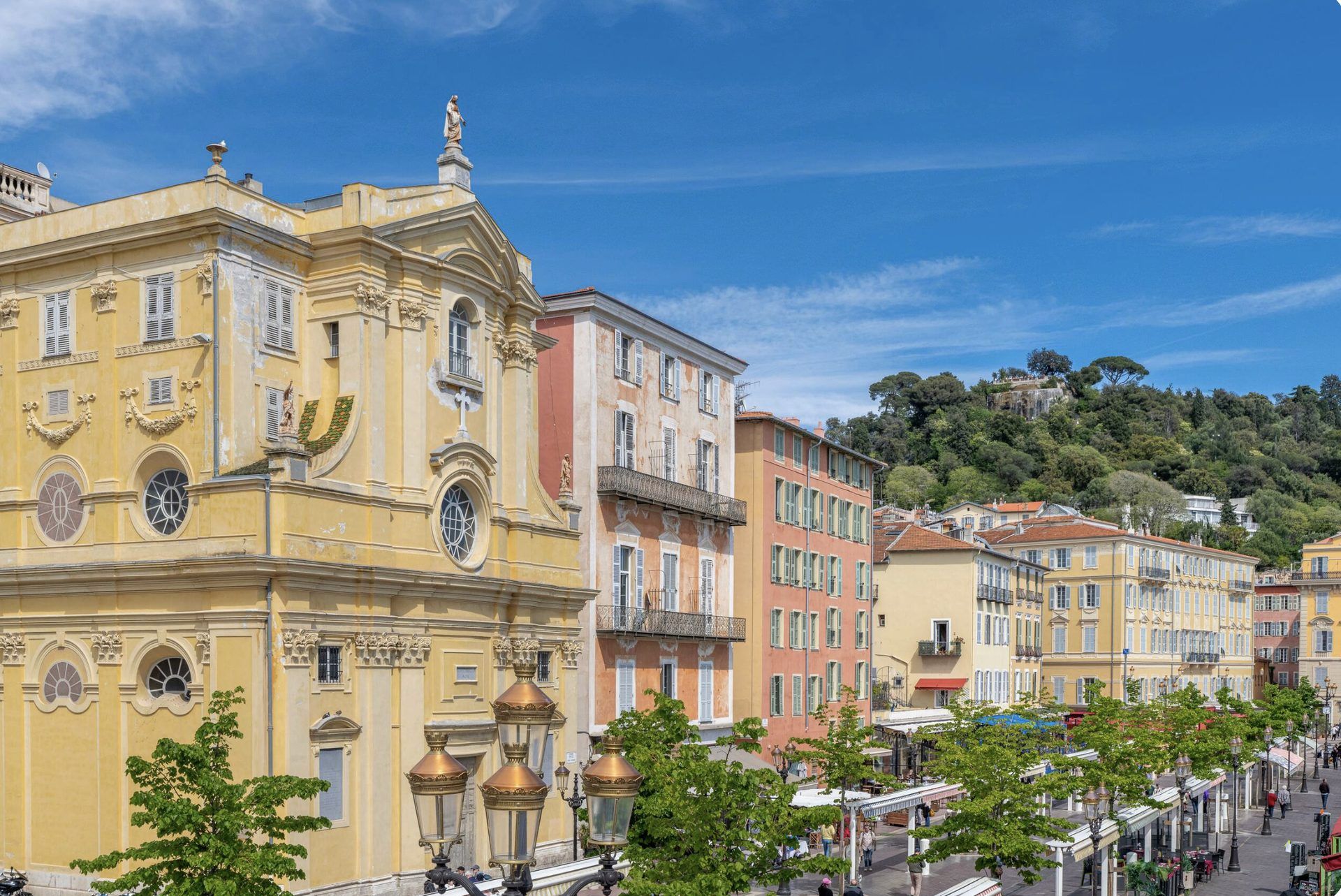 View over Vieux Nice from the Gilli apartment — ochre Old Town facades by the Cours Saleya